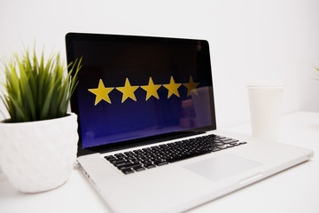 4 star rating or review in survey, poll, questionnaire or customer satisfaction research. Happy man...