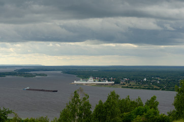 the Volga river with a barge going
