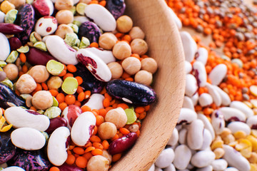 Raw legume on old rustic wooden table, close-up.