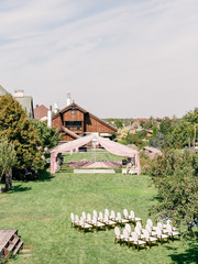 Table setting at a luxury wedding reception. Outdoor wedding