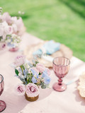 Table setting at a luxury wedding reception. Outdoor wedding