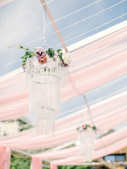 Table setting at a luxury wedding reception. Outdoor wedding