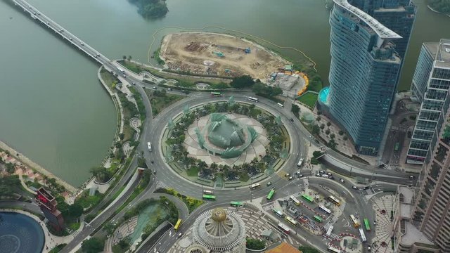 day time macau city bay traffic circle street aerial topdown panorama 4k china