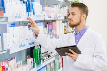 Professional pharmacist at the drugstore