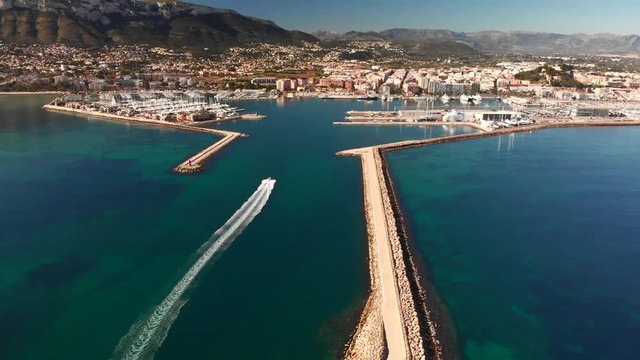 Aerial view of Denia port. The city and Montgo mountain in the background.