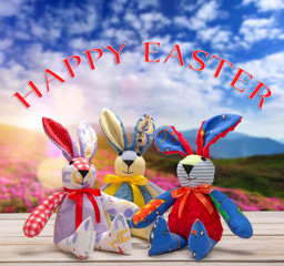 Easter bunnies with happy easter text. Easter holiday concept.