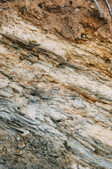 The texture of stones and minerals, in the context of the earth. Stone background for design.