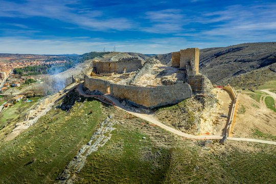 El Burgo de Osma medieval castle and town aerial view in Castille and Leon Spain with blue sky on a sunny day