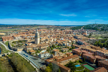 Obraz premium El Burgo de Osma medieval castle and town aerial view in Castille and Leon Spain with blue sky on a sunny day