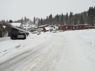Wooden Norwegian buildings in the snow