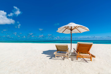 Perfect tranquil beach scene, soft sunlight and white sand and blue endless sea as tropical landscape. Luxury resort hotel, vacation and holiday landscape