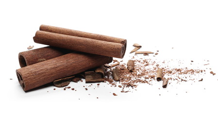 Cinnamon sticks with shavings isolated on white background