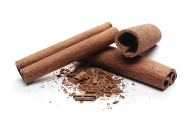 Cinnamon sticks with shavings isolated on white background