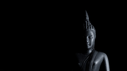 Fototapeta premium Buddha in black background