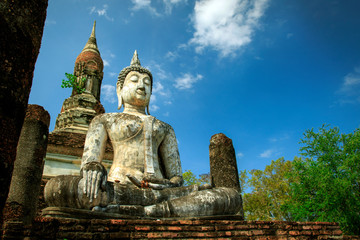 Obraz premium Buddha Statue at Sukhothai historical park in Thailand., Tourism, World Heritage Site, Civilization,UNESCO.
