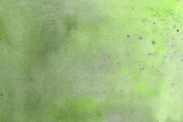 Green spring watercolor texture with abstract washes and brush strokes on the white paper background. Chaotic abstract organic design.