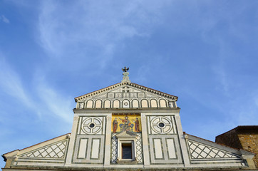 Fototapeta na wymiar Detail of the facade of the church of San Miniato in Florence. Italy.