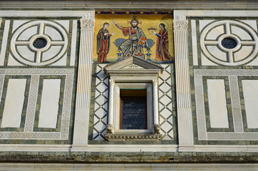 Fototapeta na wymiar Detail of the facade of the church of San Miniato in Florence. Italy.