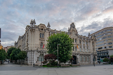Fototapeta premium City Hall of Santander at sunrise at day cloudy