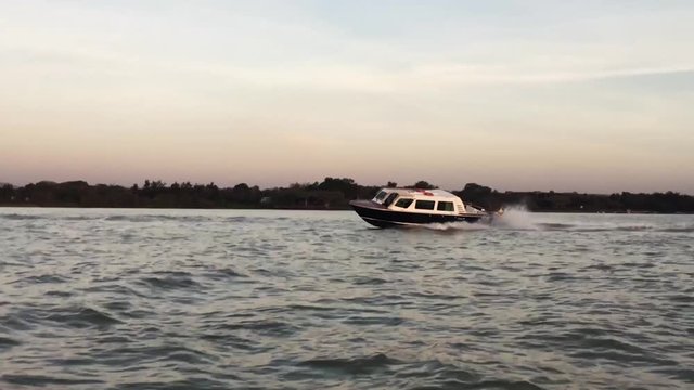 Speed boad on Lac Tana