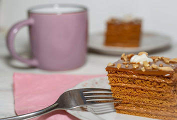 Fresh chocolate creamy cake with nuts