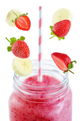Strawberry banana smoothie on a white background