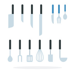 Set of knives, cutlery items and kitchen tools in a row
