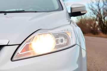 Close up of a car headlight style. © Владислав Легір