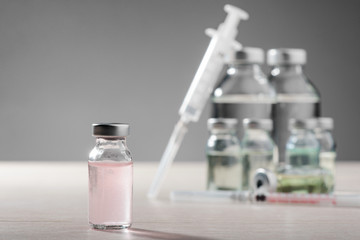 Vial of pink medication