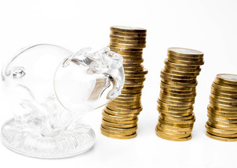 The coins are stacked, pig on the white, Savings ideas for increasing volume