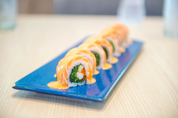Roll sushi with salmon, spicy roll , cream cheese. Sushi menu. Japanese food