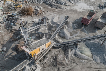 Aerial view of crushed stone quarry machine in a construction material factory 