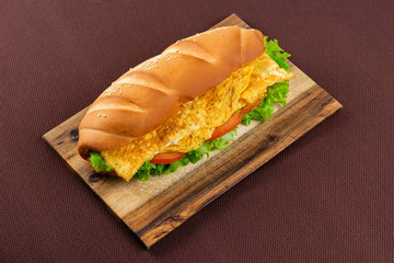 sandwich on wooden board