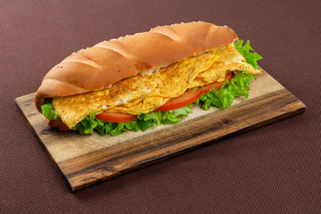 sandwich on wooden board