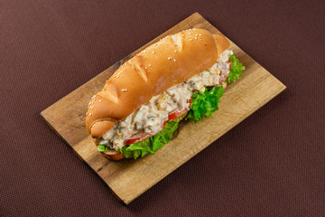 sandwich on wooden board