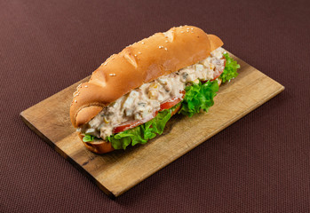 sandwich on wooden board