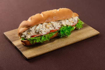 sandwich on wooden board