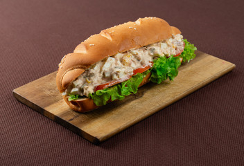 sandwich on wooden board