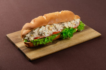 sandwich on wooden board