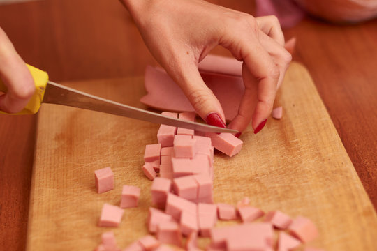 Sausage Cut On A Wooden Cutting Board