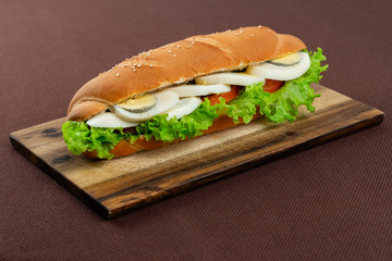 sandwich with egg greens and tomato