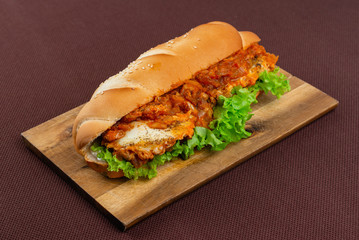 sandwich on wooden board