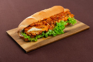 sandwich on wooden board