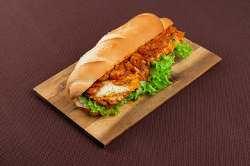 sandwich on wooden board