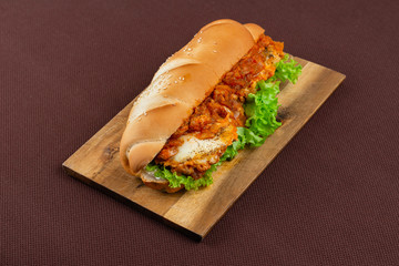sandwich on wooden board