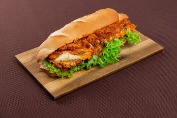 sandwich on wooden board