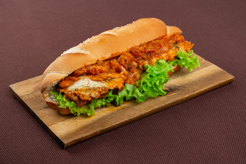 sandwich on wooden board