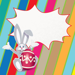Cute Easter Bunny with red ornamented egg and blank comic speech bubble isolated on a striped colorful background