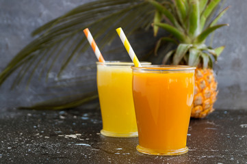 Fototapeta na wymiar Pineapple juice in a jar with a straw.