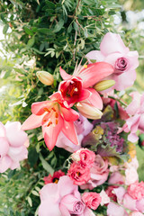 Elegant pink flowers wedding arch